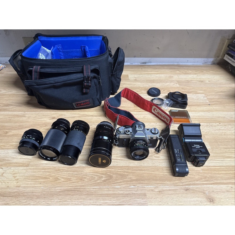 Canon AE-1 35mm SLR Film Camera with Canon 50mm f/1.8 FD Lens - Extra Lenses